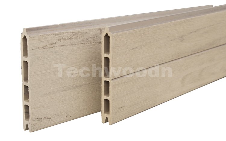 Close up of hollow beige WPC fence board profiles